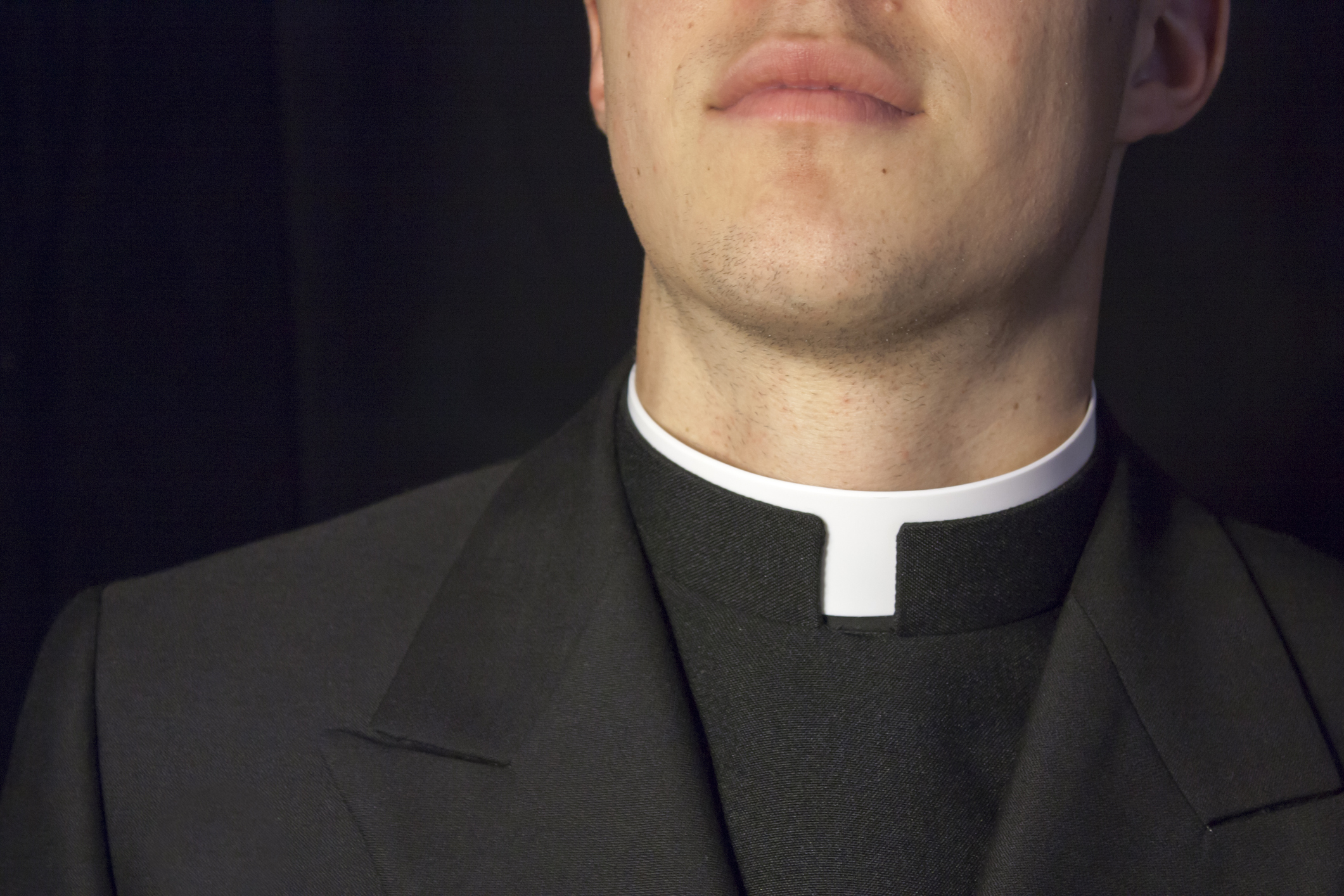 Close-up of Priest collar.